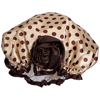 A beige Shower Caps® Fancy Shower Cap - Polka Dot decorated with brown polka dots and a ruffled maroon trim, displayed against a white background.