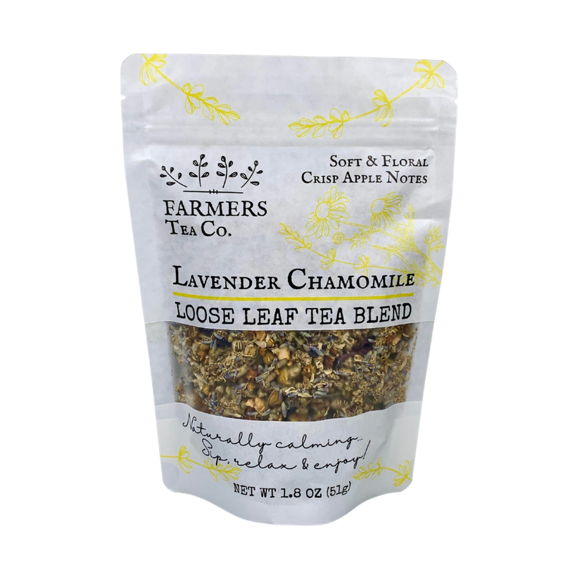 A package of FARMERS Lavender Co. lavender chamomile loose leaf tea blend, caffeine free, highlights soft and floral crisp apple notes, with visible dried tea leaves inside the transparent section.