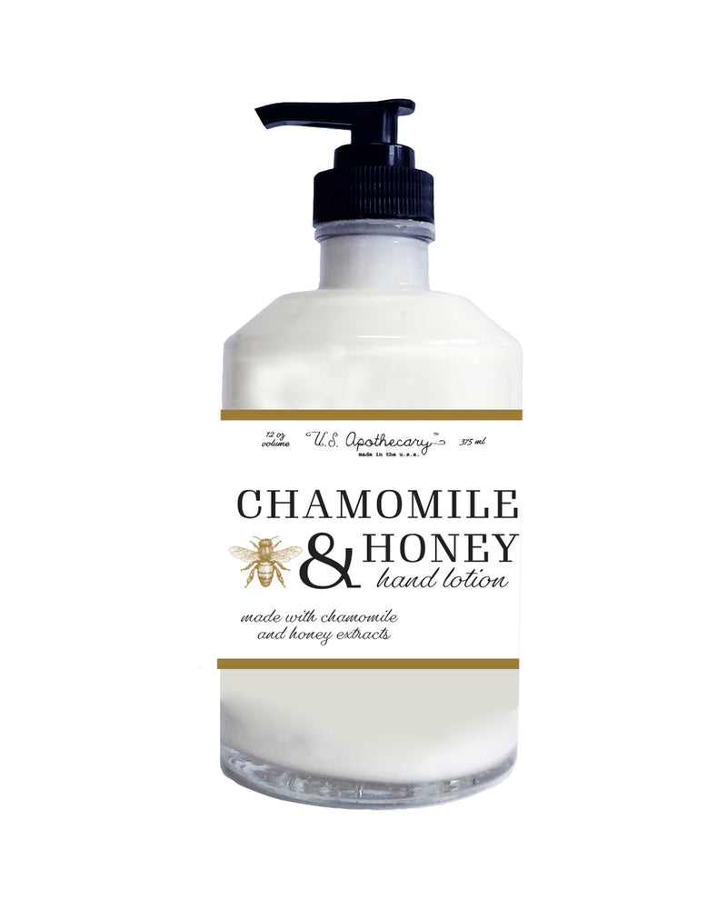 A transparent bottle of U.S. Apothecary Chamomile & Honey hand lotion with a black pump dispenser, labeled "u.s. apothecary," prominently featuring botanical ingredients.