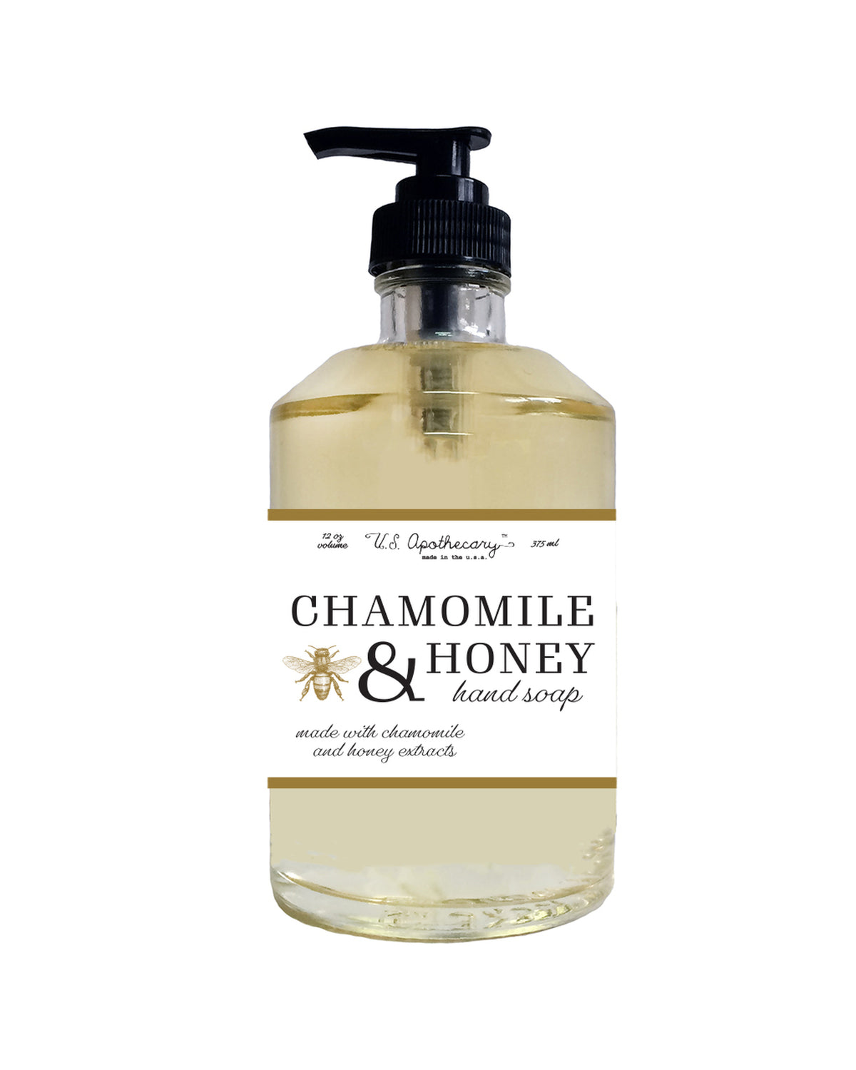 A clear bottle of U.S. Apothecary Chamomile & Honey Liquid Soap with a black pump dispenser, labeled "chamomile & honey hand soap" in elegant script, indicating it's made with chamomile and honey extracts.