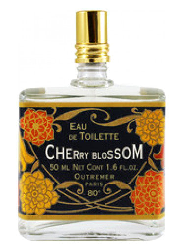 A rectangular 1.7fl oz bottle of Outremer - L'Aromarine cherry blossom eau de toilette with a black label featuring gold and red floral patterns and gold cap, against a white background.