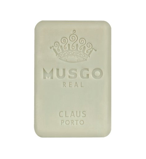 A bar of Claus Porto Musgo Real Classic Scent Single Bar Soap, displaying an embossed crown and Claus Porto 1887 on a creamy, textured background.