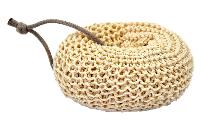 A round, beige Andrée Jardin cotton bath sponge made of natural fiber with a looped brown cord, isolated on a white background, serving as an ecological alternative for cleaning.