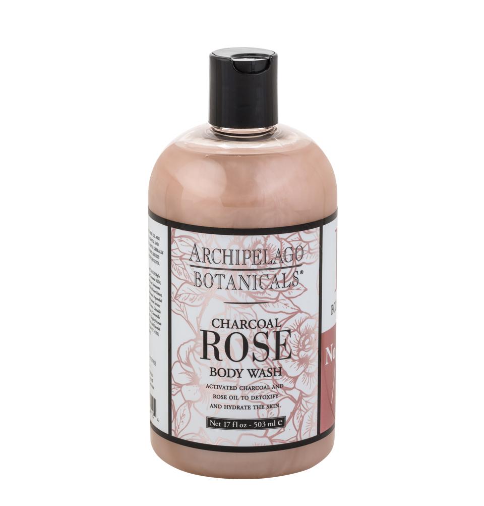 A bottle of Archipelago Botanicals Charcoal Rose Body Wash 17oz against a white background. The label features elegant typography and indicates it contains activated charcoal and fresh rose oil.