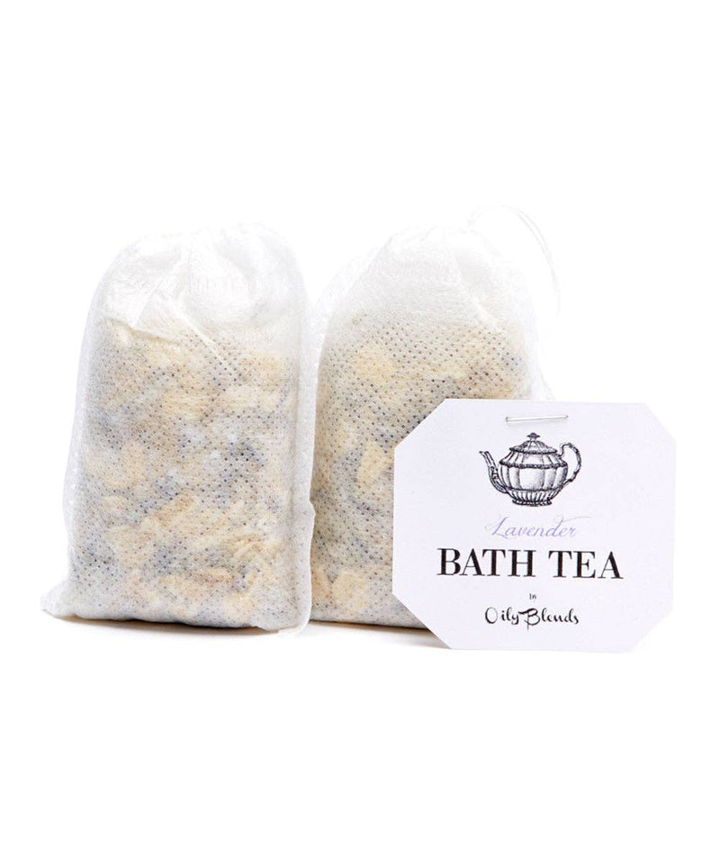 Two Hampton Court lavender Bath Tea Single Bags with visible contents, labeled with a white tag featuring the text “lavender bath tea” and a teapot logo, isolated on a white background.