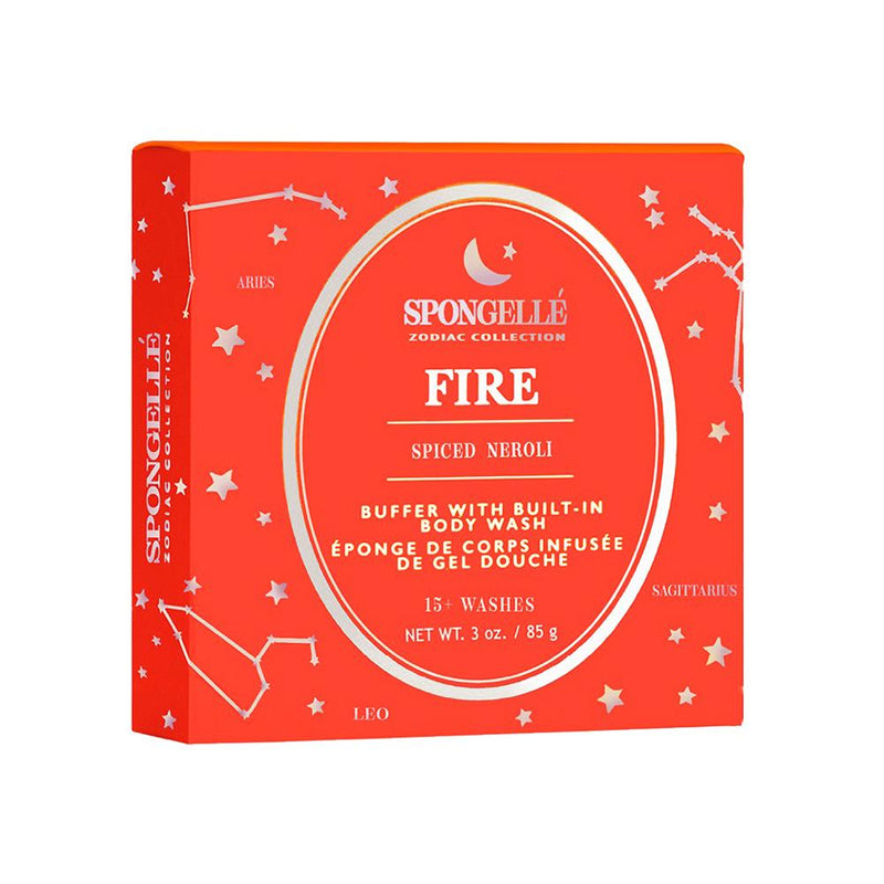 A bright orange box labeled "Spongellé - Zodiac Collection - Fire, Spiced Neroli" with zodiac symbols for Aries, Leo, and Sagittarius, indicating a body