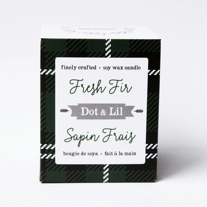 A Dot & Lil Fresh Fir Soy Candle labeled "fresh fir dot & lil" in a green box with white and black accents, showcasing both English and French languages.
