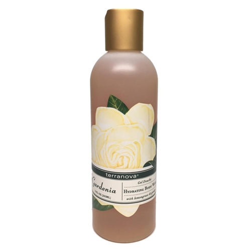 A bottle of Terra Nova Gardenia Hydrating Body Wash with a white floral label and gold cap, isolated on a white background.