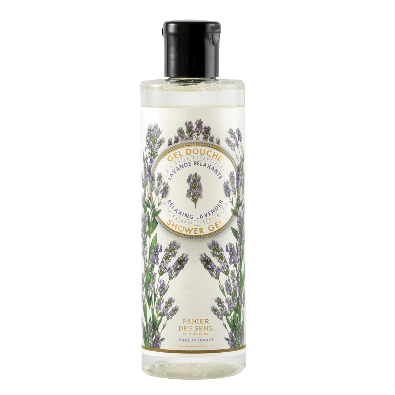 A transparent bottle of Panier Des Sens Lavender Shower Gel with a black cap, labeled "relaxing lavender", surrounded by illustrated lavender plants on a green background.