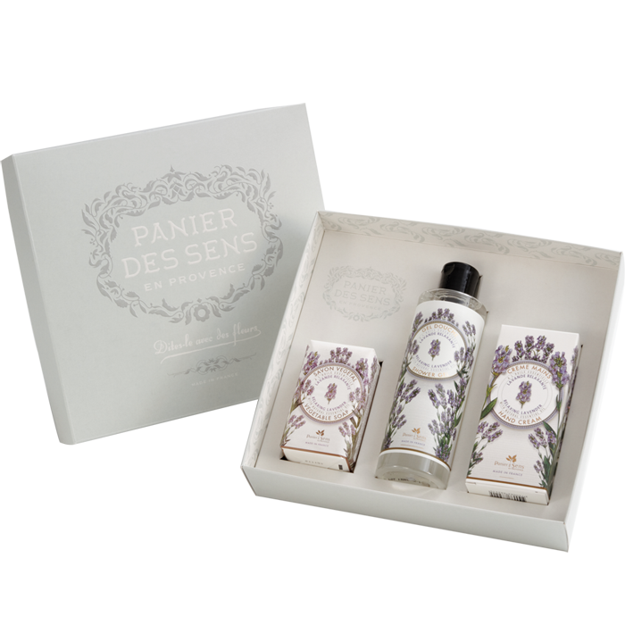 A Panier Des Sens shower gift set featuring lavender essential oil-themed body care products, including lotions and creams, in a decorative box with the brand name displayed.