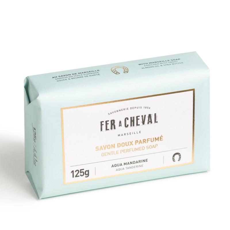 Sentence with replaced product:

A sealed bar of Fer à Cheval Gentle Perfumed Soap Bar - Aqua Tangerine 125g, labeled "aqua mandarin", weighing 125 grams, in soft pastel turquoise packaging.