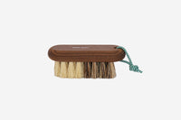A Andrée Jardin Hard & Soft Vegetable Brush Heritage with natural fibers and a green hanging loop, isolated on a white background. The brush has an engraved logo on the top.