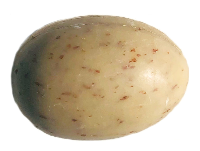 A single La Lavande Egg Soap - Honey Almond with its unique shape and speckled appearance, isolated on a white background, reminiscent of the natural texture of shea butter.