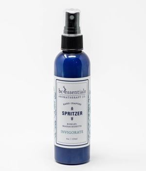 A blue spray bottle labeled "BC Essentials - Invigorate Spritzer" against a clean, white background.