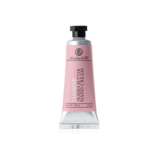 A tube of elizabeth W Botanical Apothecary Jasmine Mini-Hand Cream isolated on a white background. The tube is pink with a black cap and labeled in elegant, white typography.