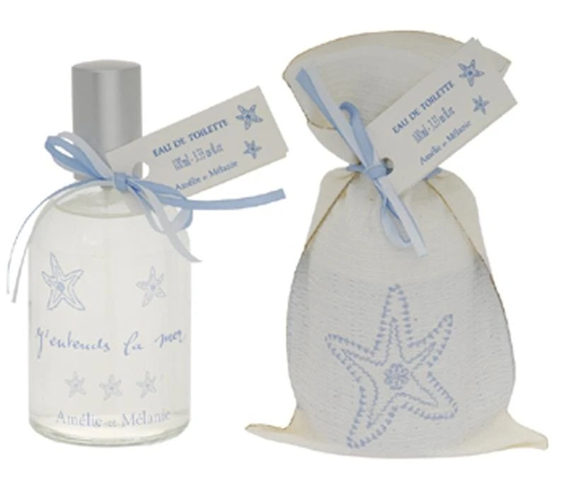 Two bottles of Amelie et Melanie J'Entends la Mer Eau de Toilette with starfish designs, one with a spray top, both tied with blue ribbons and tags, displayed next to a white drawstring bag and a starfish. (Brand Name: Lothantique)