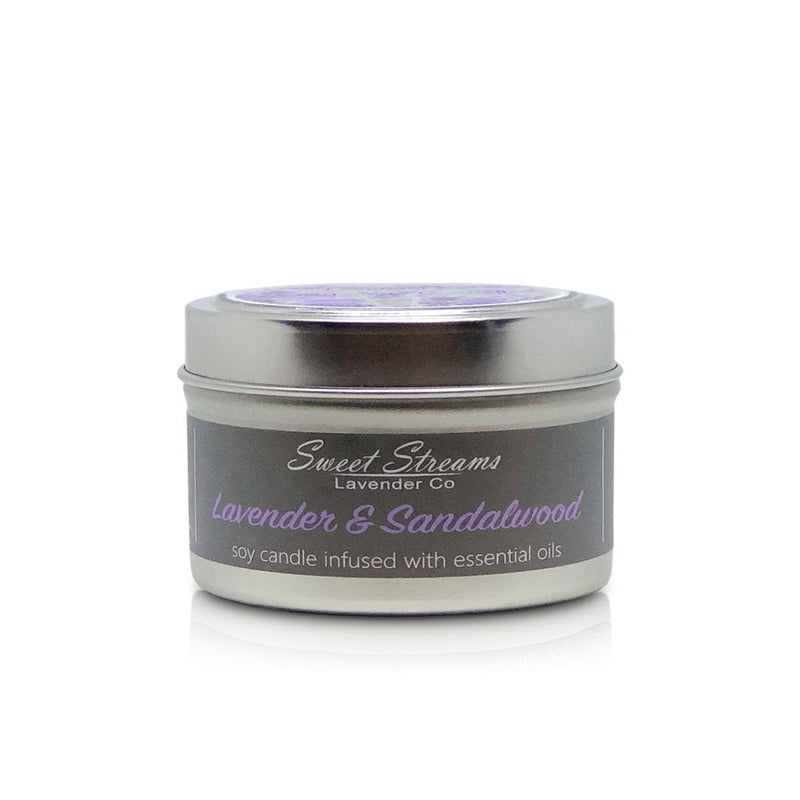 A Sweet Streams Lavender Co. - Pure Lavender Sandalwood Soy Travel Tin Candle in a small metallic container with a lid, isolated on a white background. The label displays the brand "Sweet Streams Lavender Co.