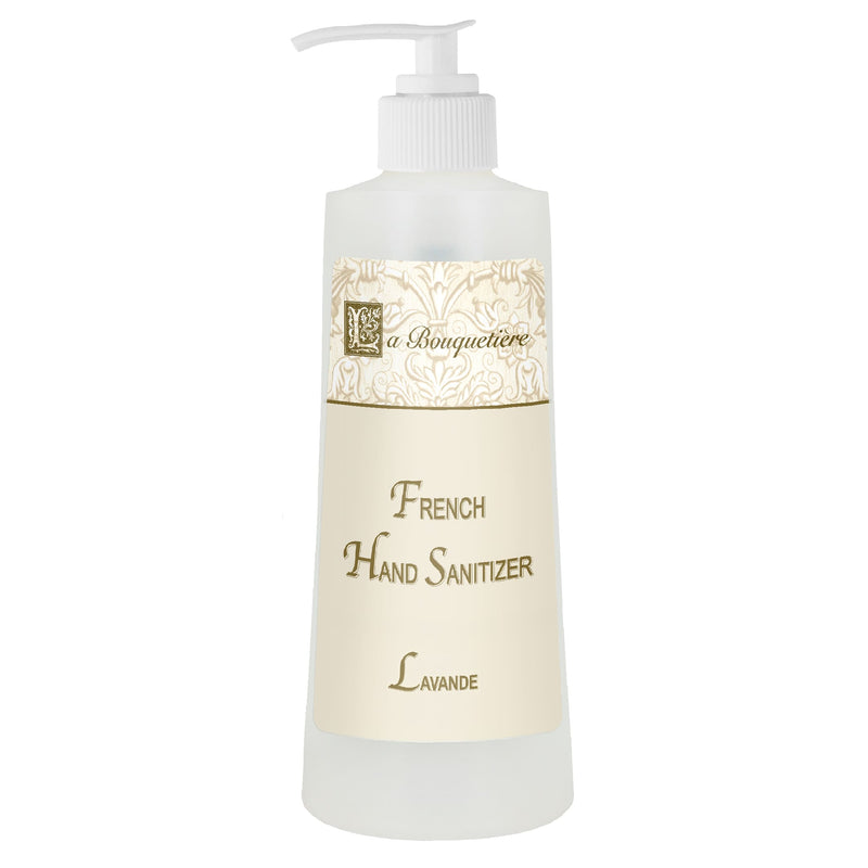 A bottle of La Bouquetiere Lavender French hand sanitizer with an elegant cream and gold design and a white pump dispenser, formulated with organic aloe vera.