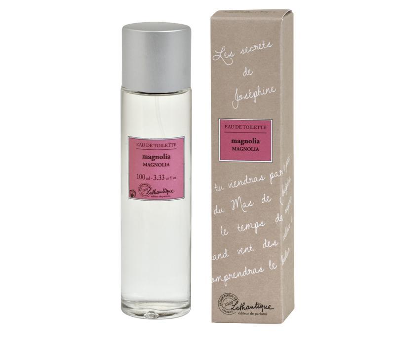 A bottle of "Lothantique The Secrets of Josephine Magnolia Eau de Toilette" by Lothantique next to its corresponding brown cardboard packaging with descriptive text in French, promising a long-lasting fragrance.
