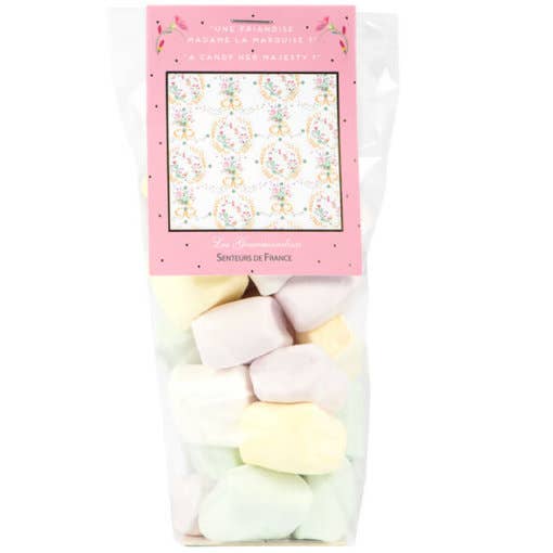A bag of pastel-colored Senteurs De France Versailles Confectionery old-fashioned marshmallows in pink, yellow, and green, with floral and polka dot patterns on the packaging.