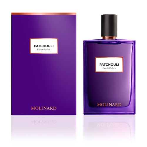 A purple rectangular bottle of Molinard Patchouly Eau de Parfum, a unisex oriental fragrance, stands next to a matching purple box with the same label and “Molinard” in gold lettering.