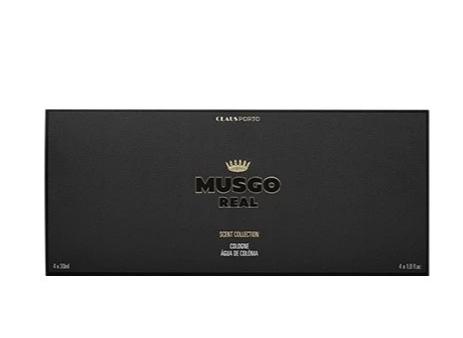 A rectangular black box with gold "MUSGO REAL" and crown design, topped by "Claus Porto 1887," contains the Claus Porto Gift Box of 4 Mini Musgo Real Colognes—a perfect gift for fans of masculine fragrances.