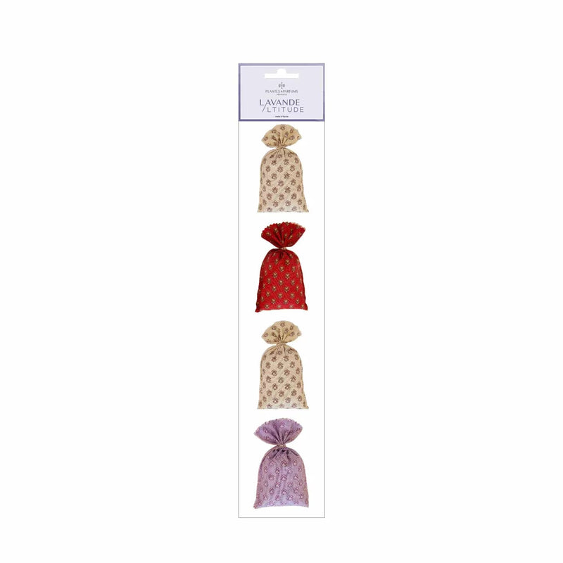 Packaging of La Lavande bath bombs with five different colored bombs displayed vertically, including beige and red. The background is simple and white, emphasizing the product. La Lavande Strip of Lavender Sachets - Classic French Fabric accompany.