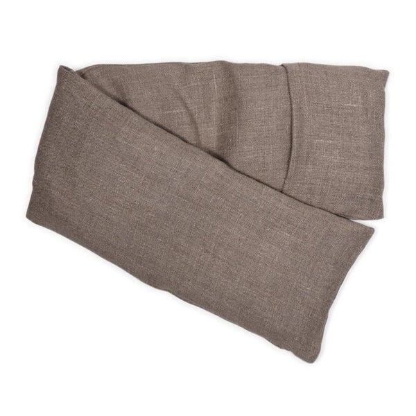 A folded elizabeth W Linen - Natural Hot/Cold Flaxseed Pack isolated on a white background.