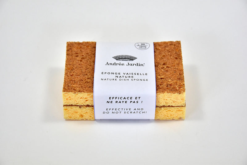 Two Andrée Jardin Natural Dish Sponges made from wood pulp cellulose with a label "andrée jardin éponge vaisselle naturelle" between them, on a white background. The label states the s