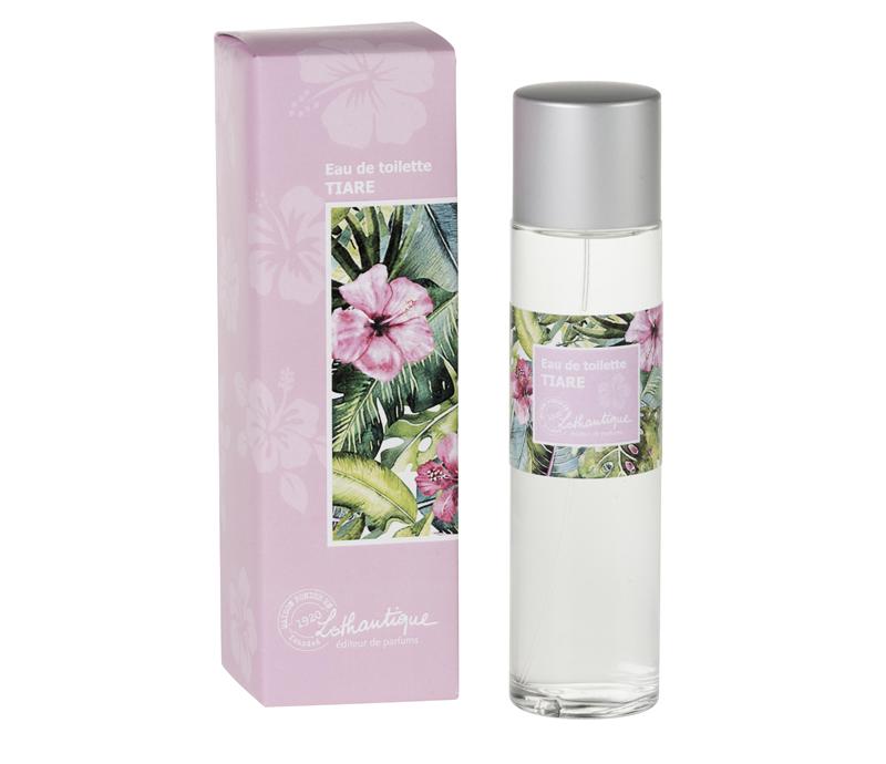 A bottle of Lothantique The Secrets of Josephine Tiara Flowers Eau de Toilette next to its pink packaging box, both decorated with tropical floral designs.