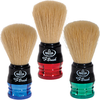 Three Odds & Ends Omega S-Brush synthetic shaving brushes with black, red, and blue handles are displayed against a white background. Made in Italy and animal-friendly, these brushes provide an excellent shaving experience.