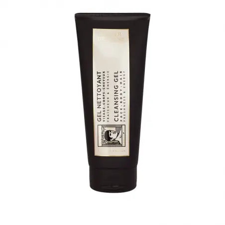 A black tube of Panier des Sens L’Olivier Cleansing Gel for Face, Body & Hair on a white background, labeled in white and featuring a small logo near the bottom. The text provides product and brand information, including its content of organic olive oil from Prov.