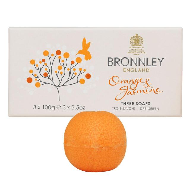 Box of Bronnley English Soaps orange & jasmine soaps with one Bronnley English Soaps orange spherical, triple milled soap displayed in front of the box, featuring a botanical and butterfly design.