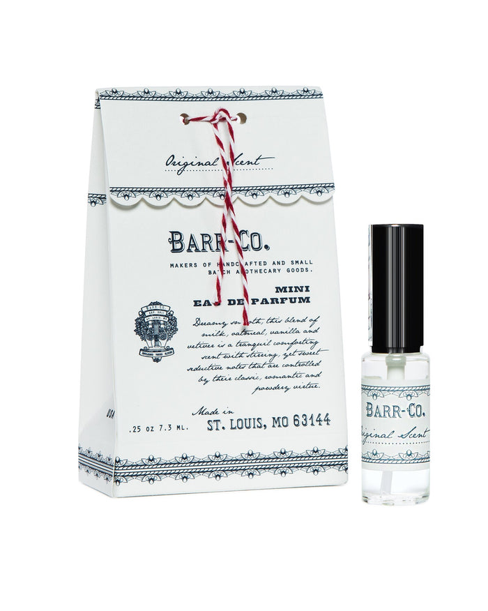 An image displaying a packaging box and a small spray bottle of Barr-Co. Original Scent Mini-Perfume, tied with a red and white string, featuring elegant, vintage-style labeling.