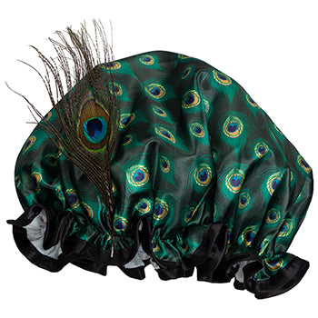 A vibrant Fancy Shower Cap - Peacock Design in green and blue, embellished with an actual peacock feather on the side, isolated on a white background.