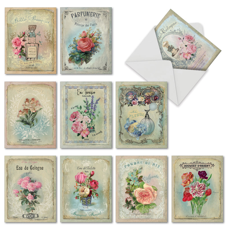 A collage of vintage French All Occasion Boxed Note Cards - Scentiments labels featuring floral designs and elegant typography, displayed on high-quality recycled stock in various muted tones. One label is shown partially pulled out from an envelope. (Brand Name: The Best Card Co.)