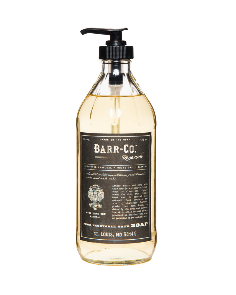 A clear bottle of Barr-Co. Reserve Liquid Hand Soap with a black pump. The label displays product details and the text "St. Louis, MO 63144.