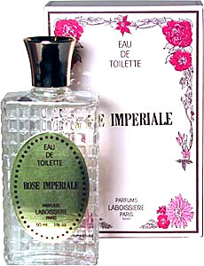 A bottle of Laboissiere Rose Imperiale EDT with a label featuring elegant floral designs, centered around a feminine fragrance, set against a backdrop echoing similar motifs by Laboissiere Parfums Paris.