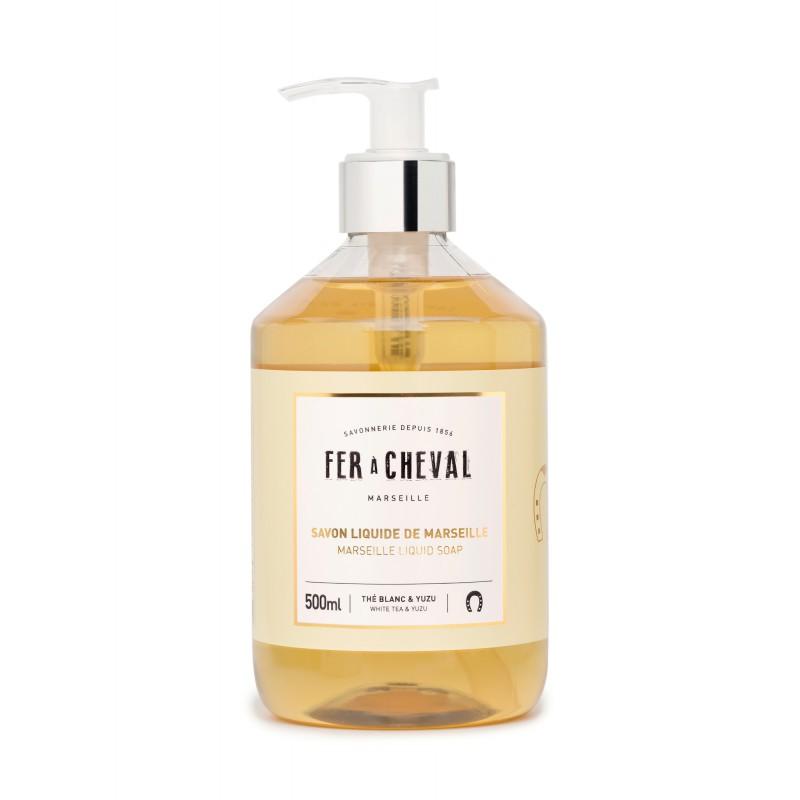 A 500ml clear plastic pump bottle of Fer à Cheval Marseille Liquid Soap White Tea & Yuzu with natural ingredients, featuring a clean, simple label on a white background.