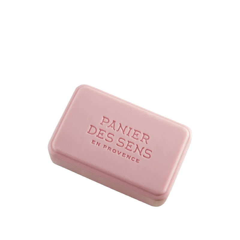 A pink shea butter soap bar with the embossed text "Panier Des Sens en Provence" on a plain white background.