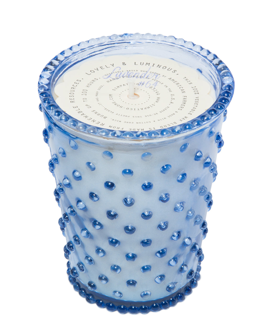 A Simpatico NO. 64 Lavender Hobnail Glass Candle holder embellished with darker blue dots and a decorative lid featuring elegant script writing, ideal for Simpatico NO. 64 Lavender Hobnail candles.