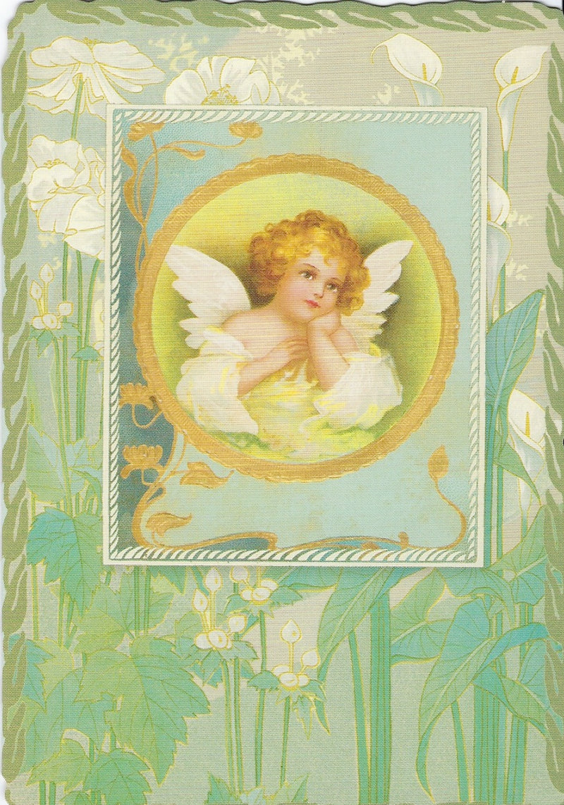 Vintage illustration of an emotional support angelic child with golden curly hair and wings, framed in a circular border against a backdrop of white flowers and green foliage on the Friendship Greeting Card - Art Nouveau Angel (Thinking of You) from Greeting Cards brand.