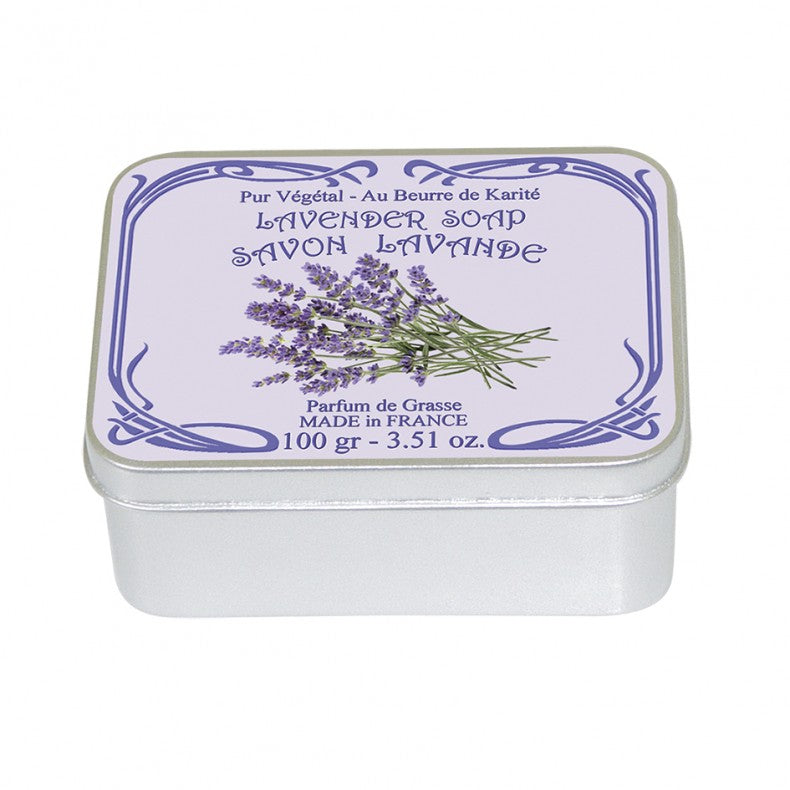 A square metal tin of Le Blanc Lavender 100gm soap labeled in French, emphasizing its Grasse perfume and shea butter content, against a plain background. Made by Le Blanc in France.