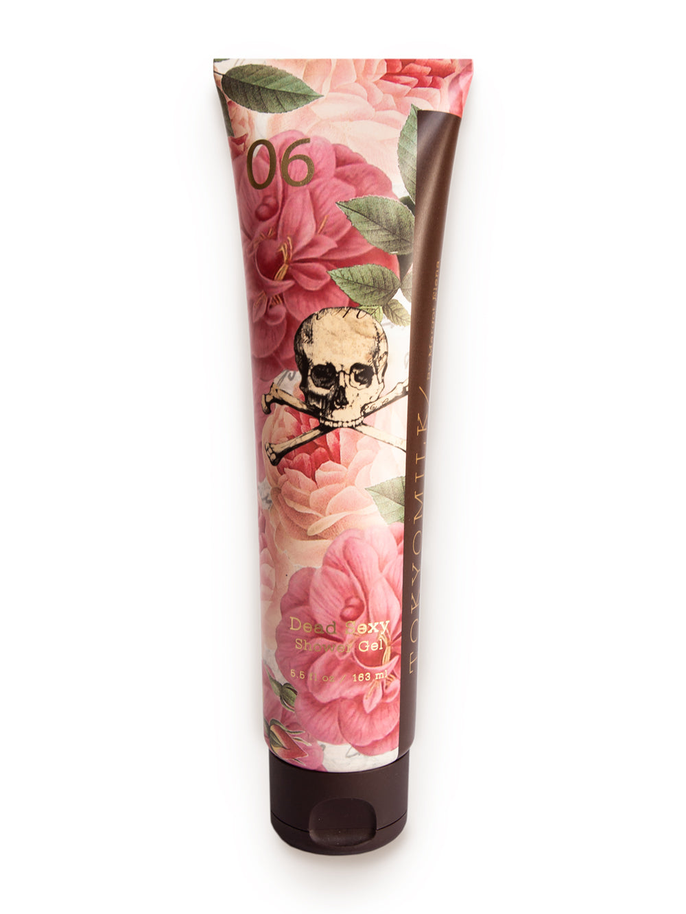 A tube of TokyoMilk Dead Sexy Perfumed Shower Gel by Margot Elena, with a floral and skull design, featuring pink roses and black text, offering luxurious moisture, isolated on a white background.