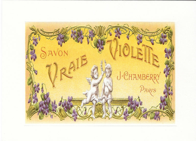 Vintage decorative label for "All Occasion Greeting Card - Vraie Violette" by Greeting Cards featuring two cherubs, violet flowers, and ornate gold satin envelope accents.